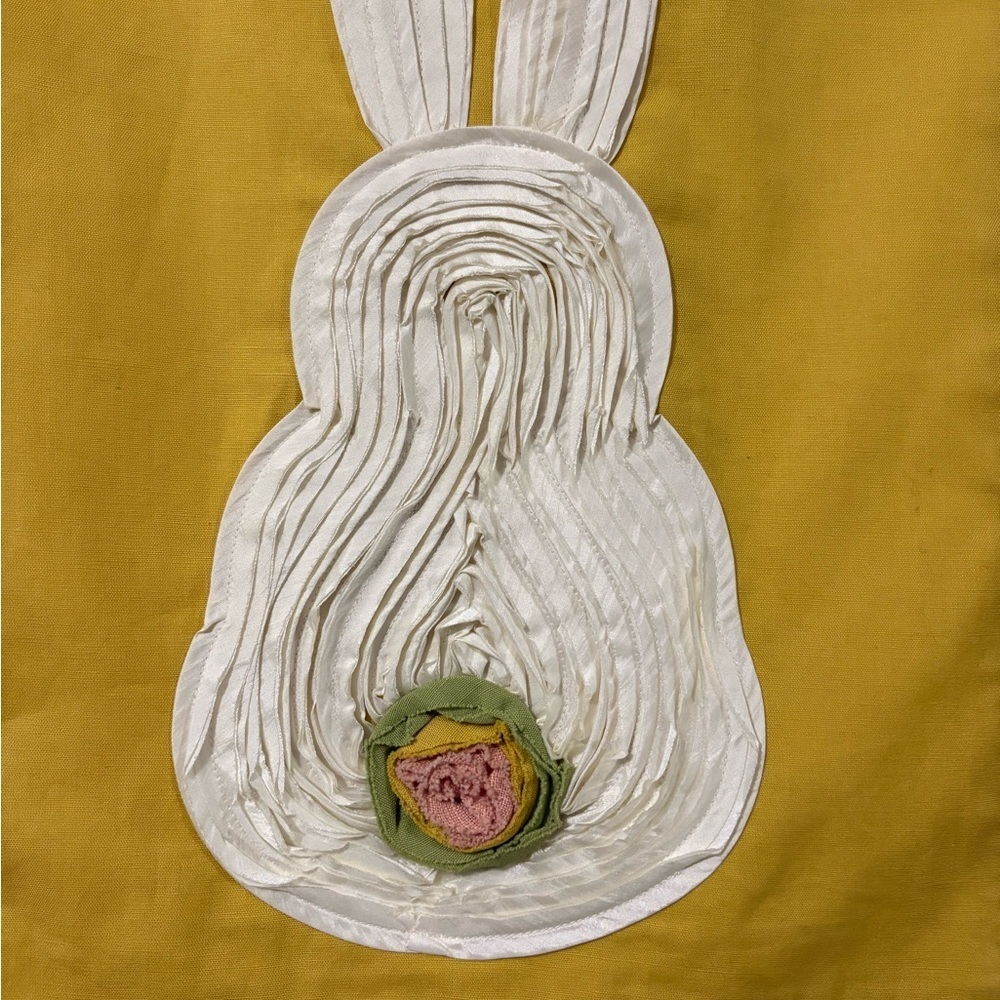 Cute bunny table runner by Pier 1 Imports. Golden yellow with cream bunnies.